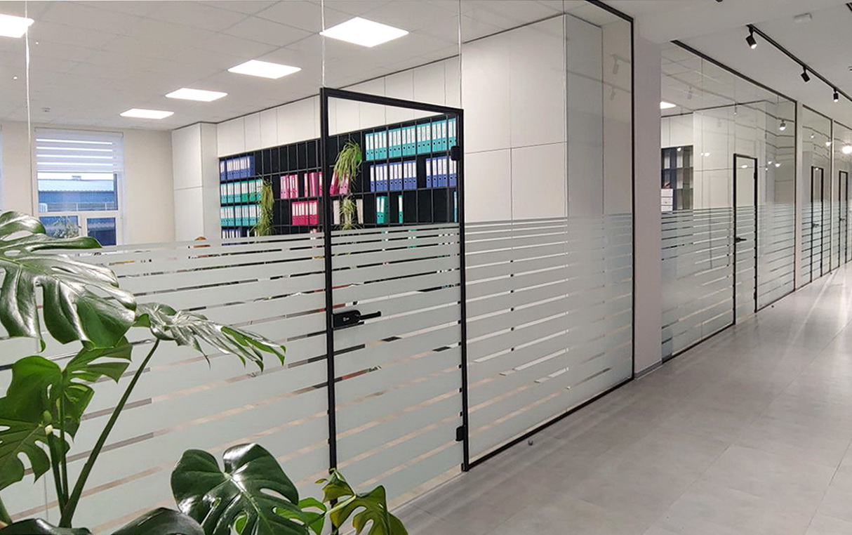 Glass partitions with door in frame