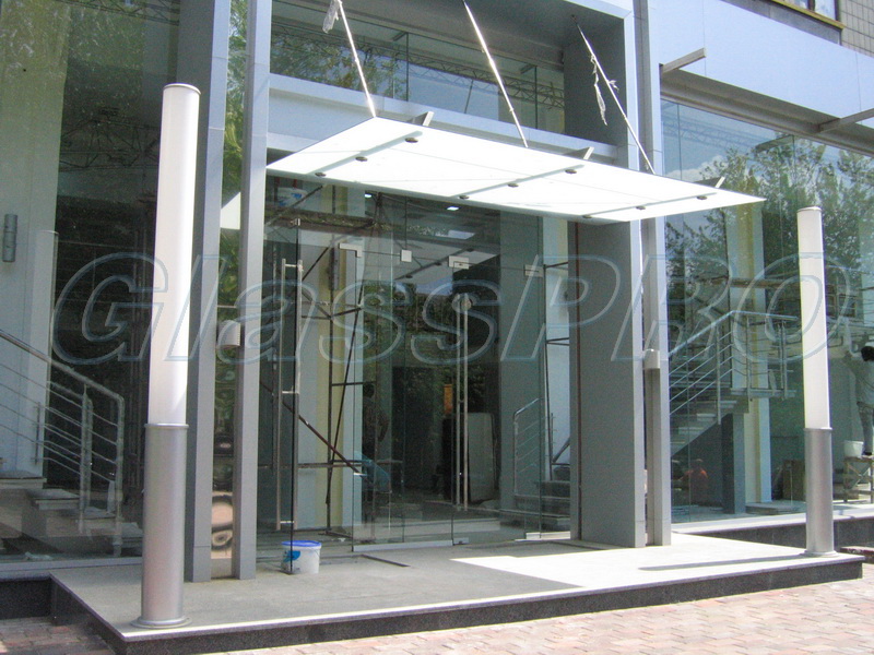 Glass canopy on truss rods with frame structure, architectural salon - Kyiv