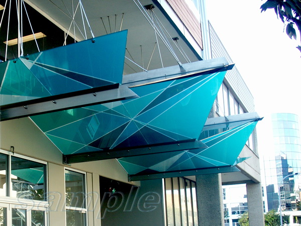 Decorative glass canopy of complicated shape on rods and cantilever elements