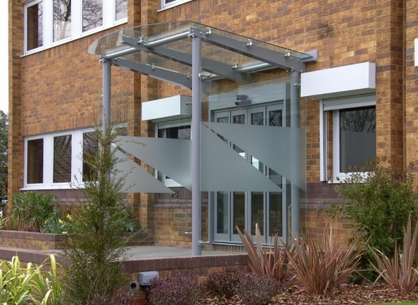 A glass overhang - a way of integrating a storefront into an office building