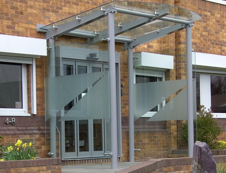 A glass overhang - a way of integrating a storefront into an office building