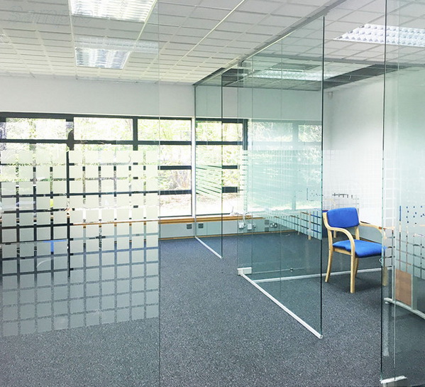 Glass office partitions with swing doors