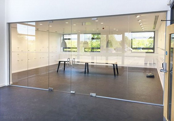 Glass office partitions with double leaf swing door