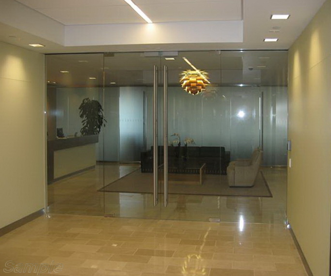 Glass office partitions with double leaf swing door