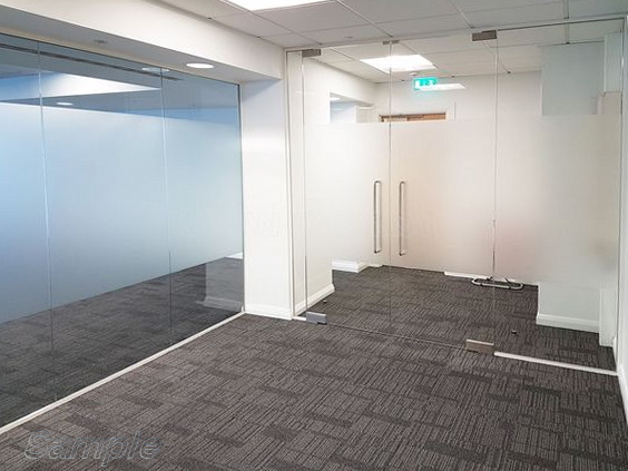 Glass office partitions with double leaf swing door