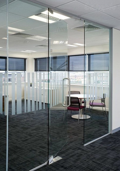 Glass office partitions with swing doors