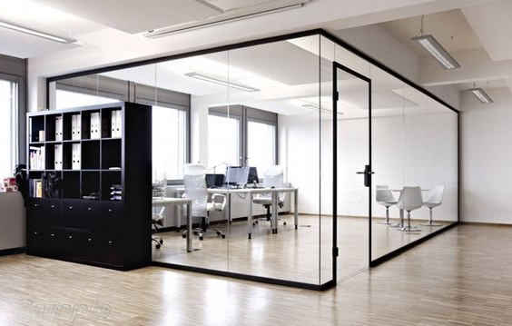 Glass office partitions with a swing door in an aluminum frame