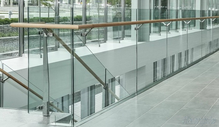 Model GS-01. Self-supporting glass stair railing with profile mounting