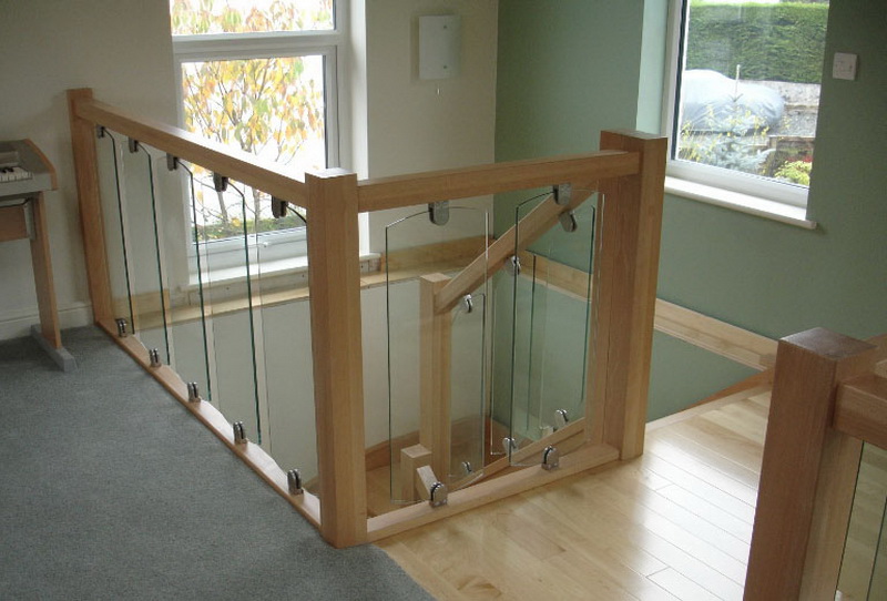 Model GF-02. Frame glass stair railing on mounts